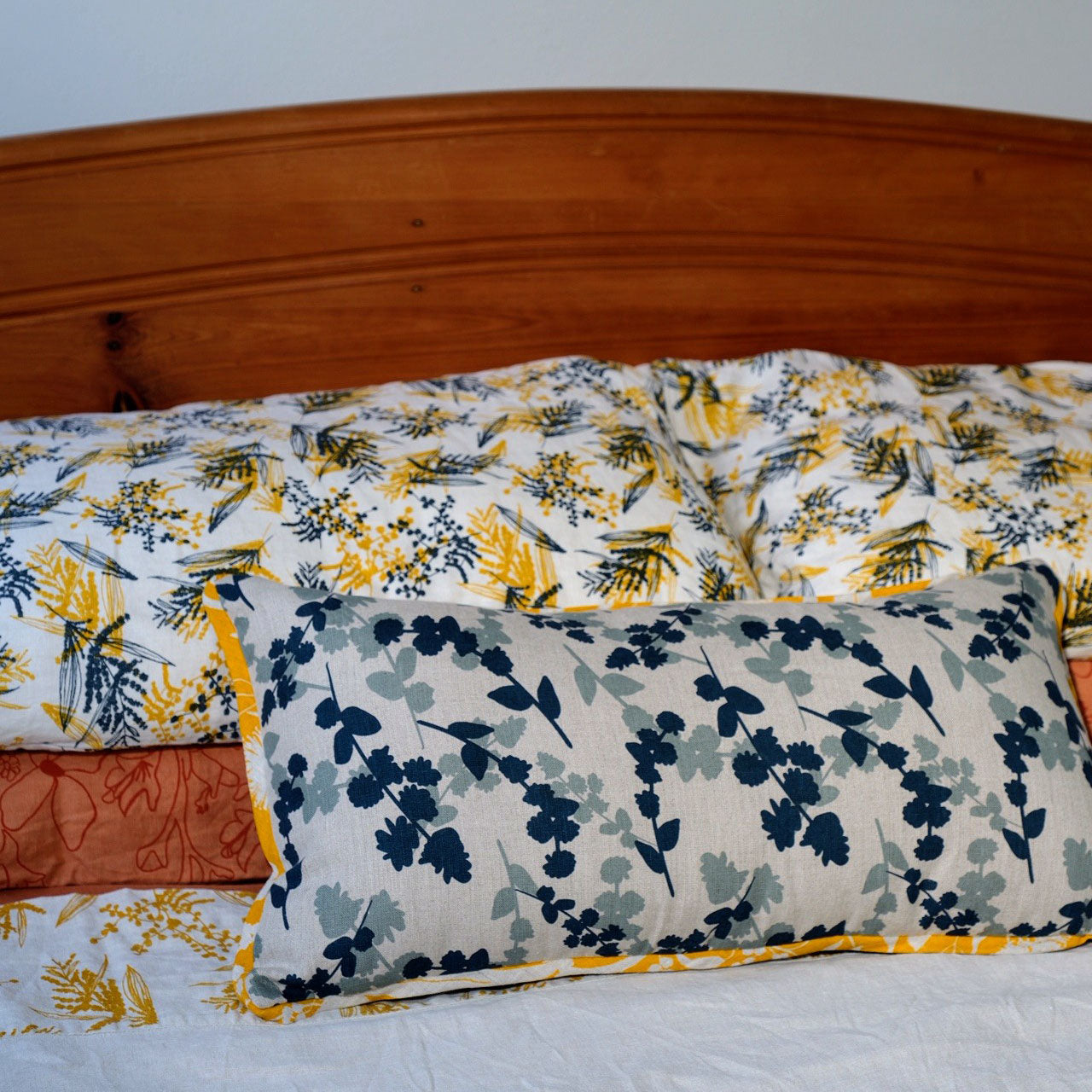 Long Linen Cushion Cover Featuring Seedpods and Wattle Sprigs