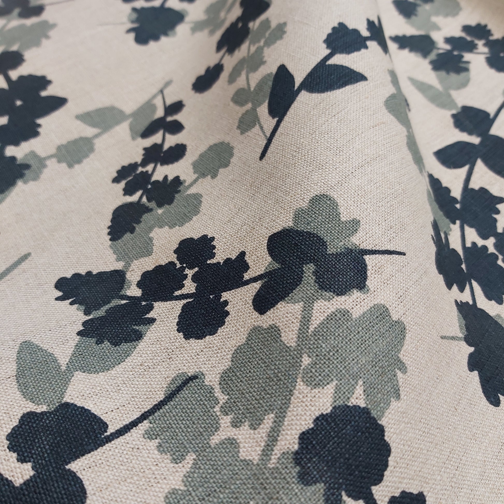 Hand screen printed linen featuring wattle sprigs pattern in storm and indigo. Printed and designed by Femke Textiles