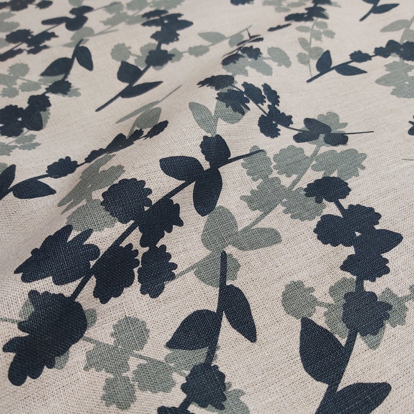 Hand screen printed linen featuring wattle sprigs pattern in storm and indigo. Printed and designed by Femke Textiles