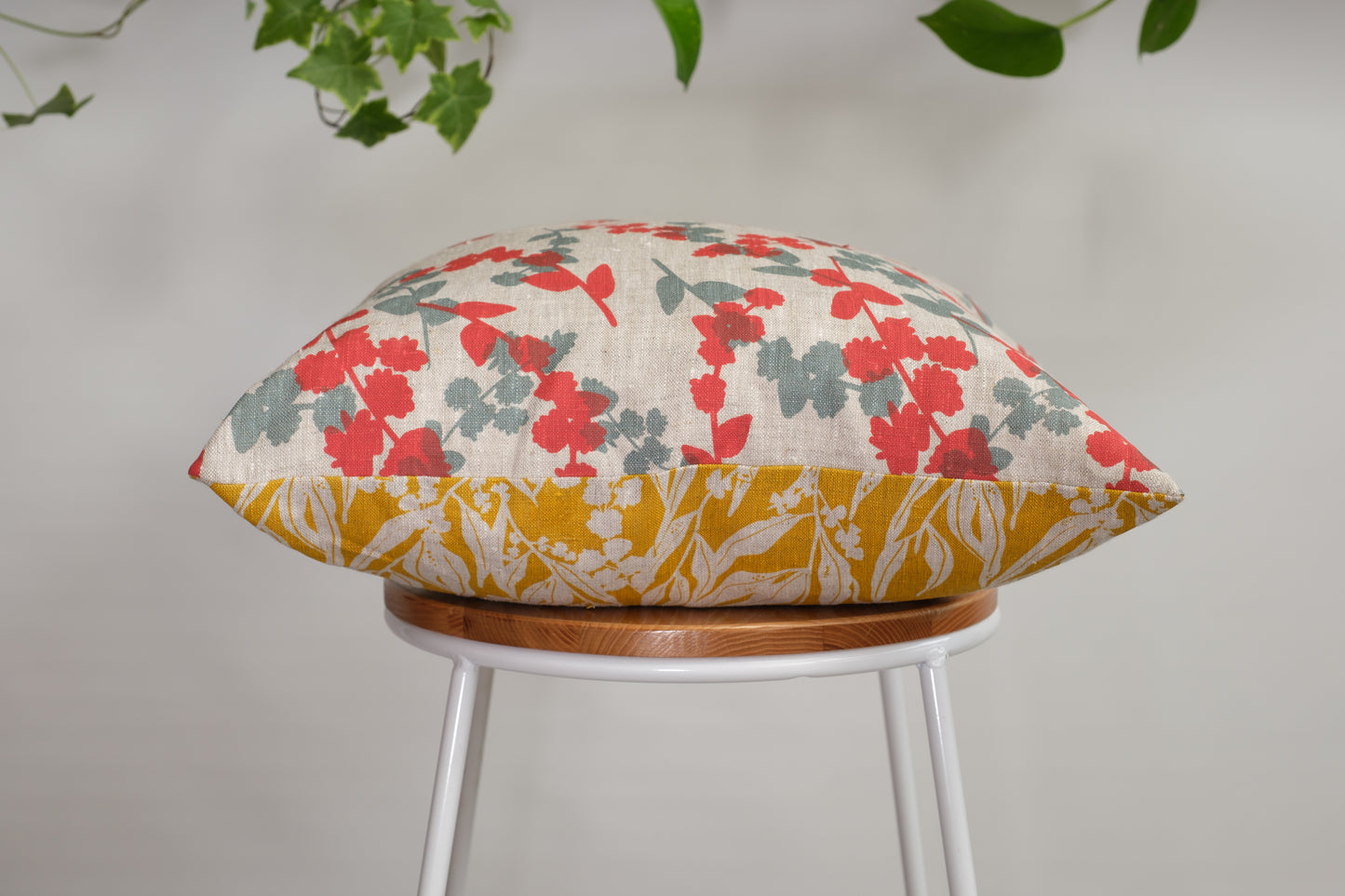 Linen cushion cover featuring hand screen printed wattle sprigs and nuts about wattle. Designed and made by Femke Textiles