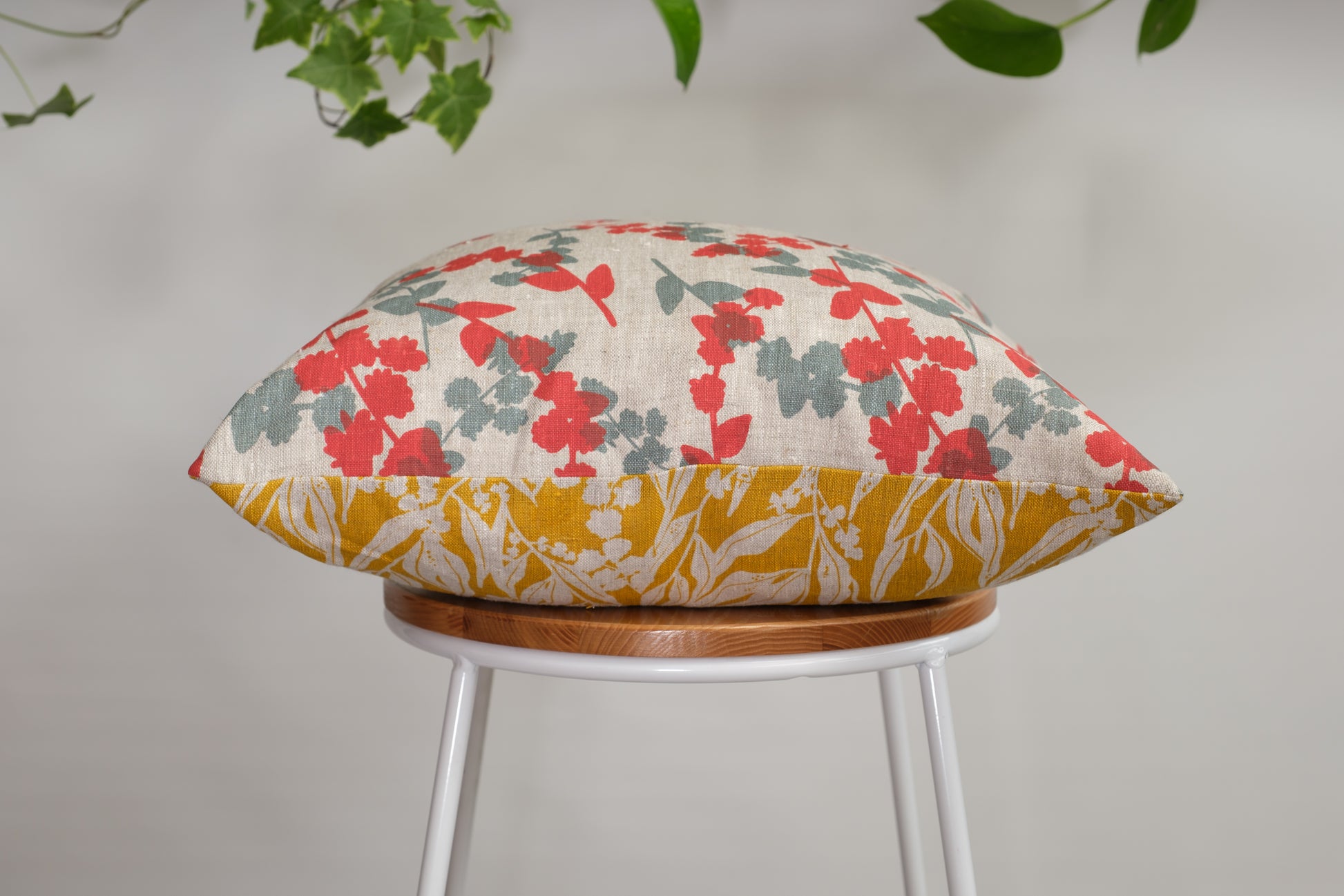 Linen cushion cover featuring hand screen printed wattle sprigs and nuts about wattle. Designed and made by Femke Textiles