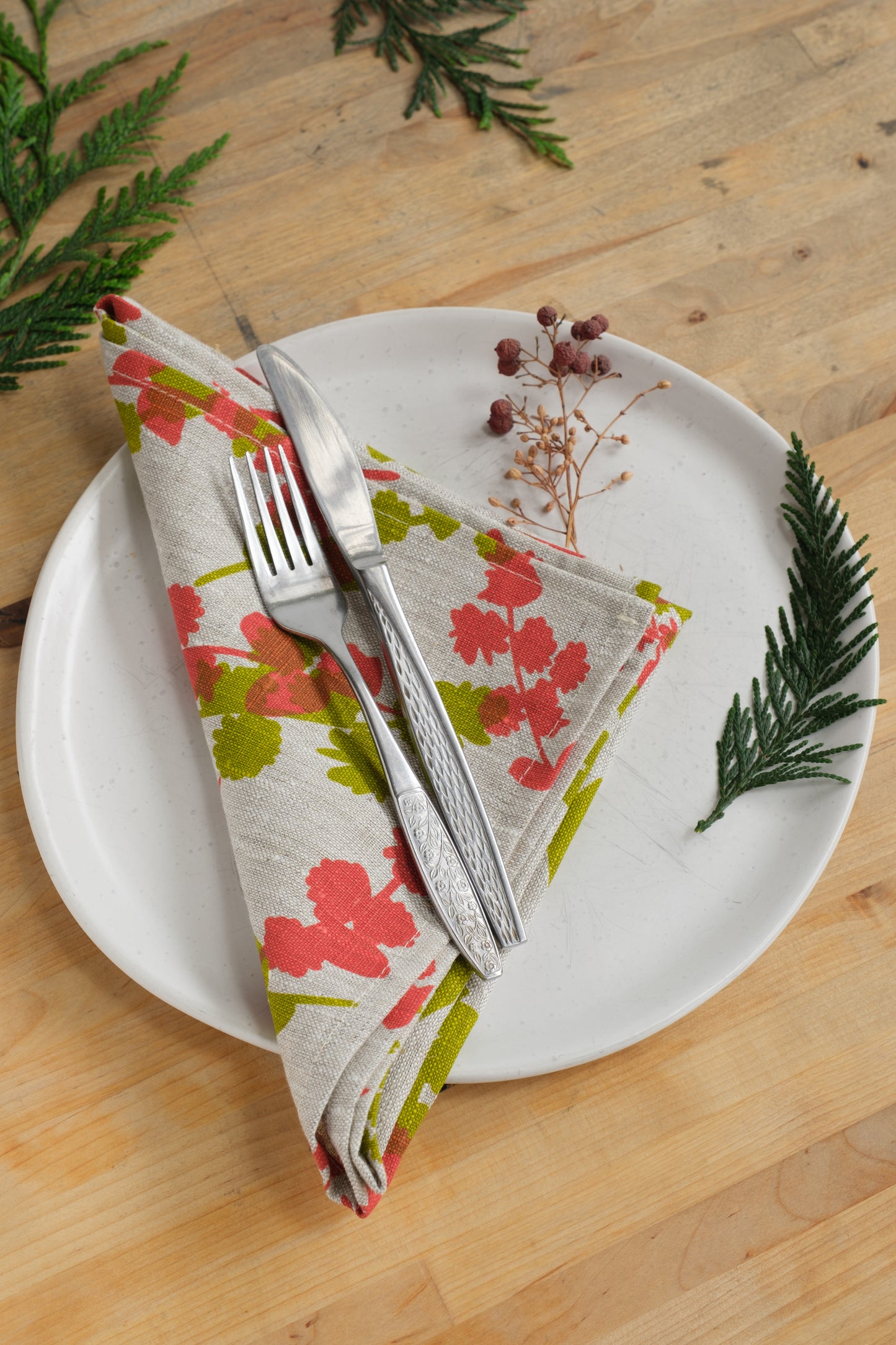 Linen napkins screen printed with Wattle Sprigs in Guava and Chartreuse. Designed and screen printed by Femke Textiles.