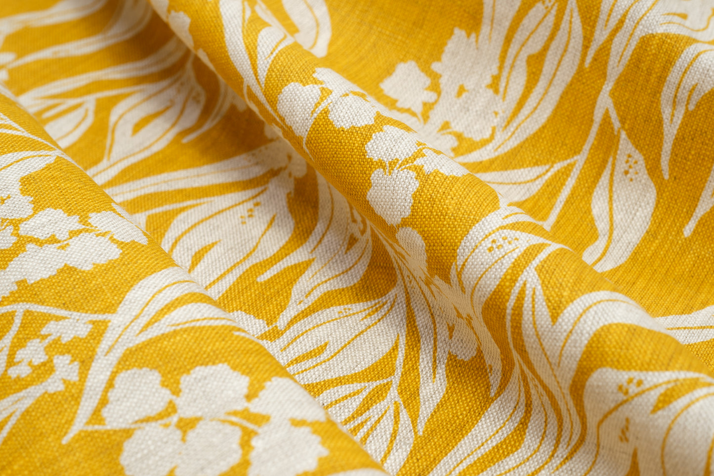 Screenprinted linen fabric by Femke Textiles featuring Nuts about Wattle in Mustard on an oatmeal linen.