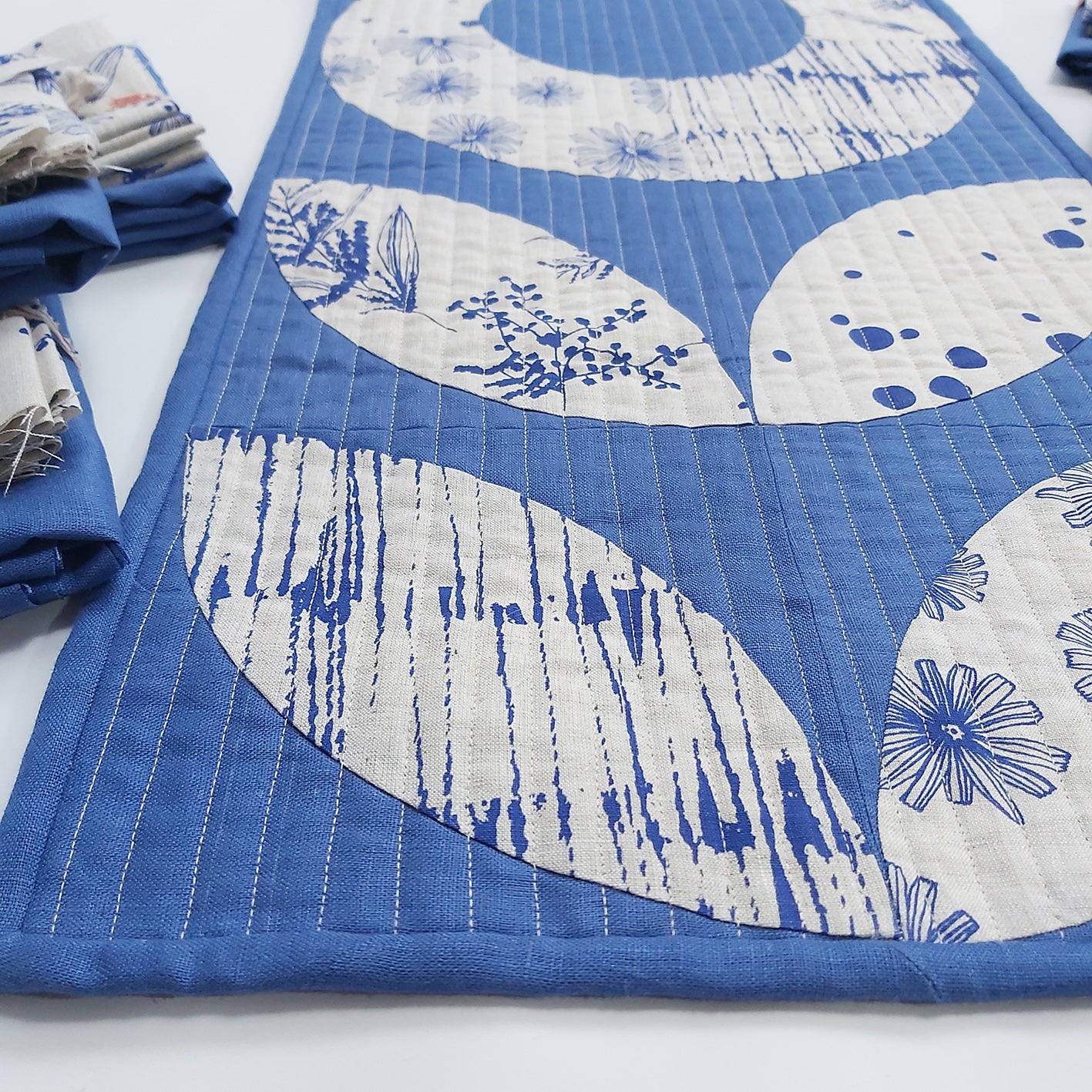 Tall Poppy wall hanging designed by Stitch and Yarn and screenprinted fabric by Femke Textiles. All linen fabrics.