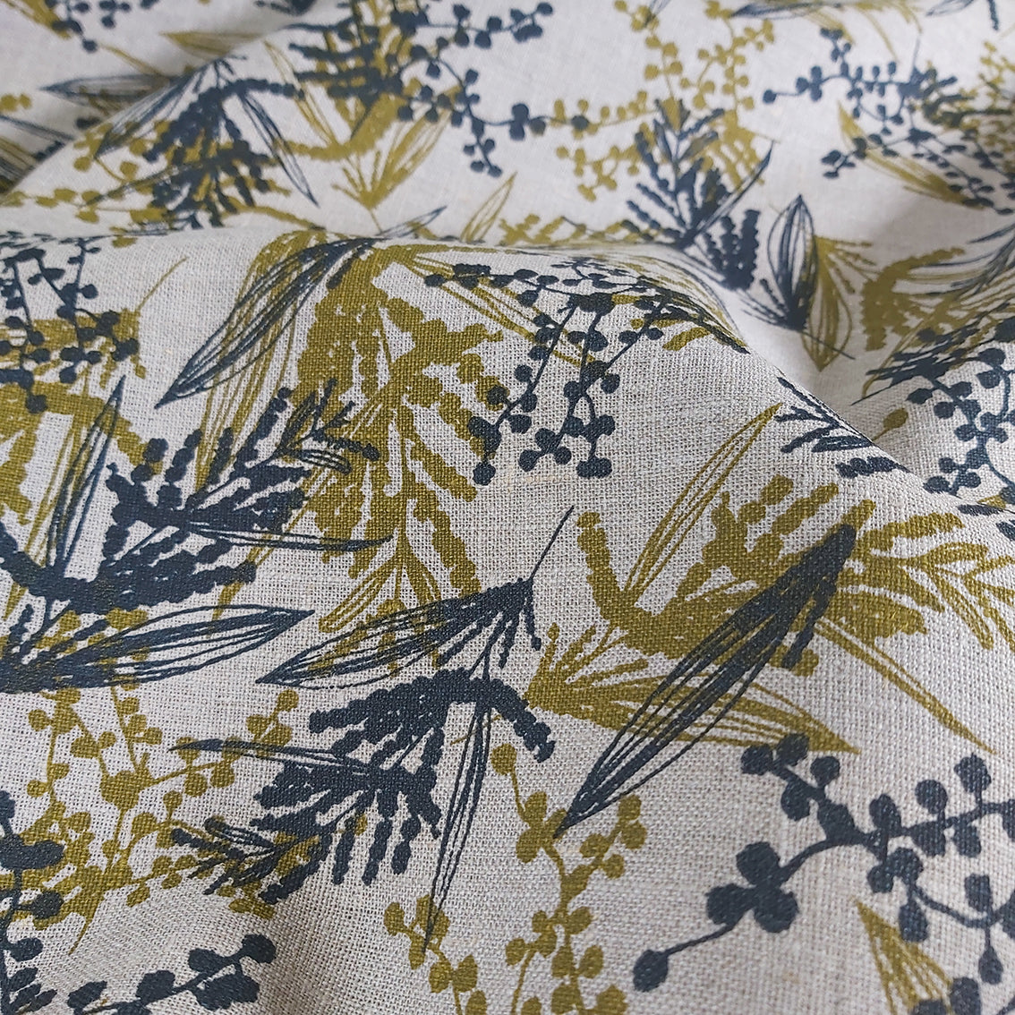 Mixed wattle screenprint on flax linen in olive oil and indigo. Designed and printed by Femke Textiles.