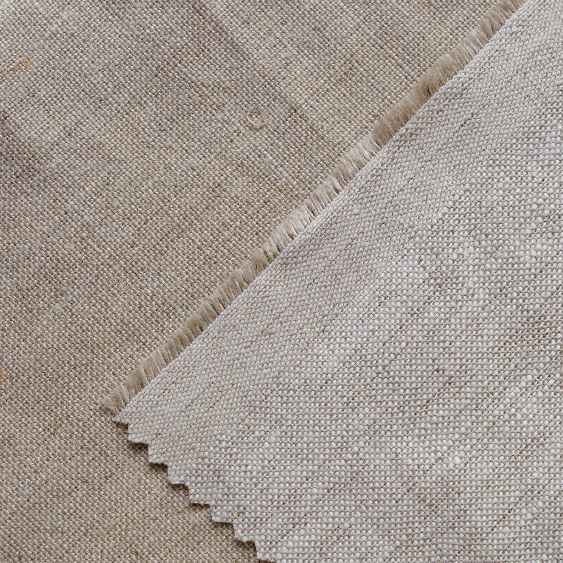 Linen in oatmeal base which is lighter in colour and flax base, darker in colour.