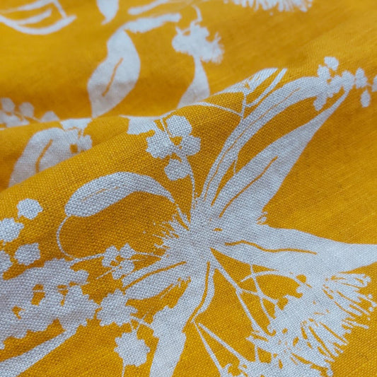 Screen printed linen featuring Forager's Delight pattern in wattle yellow. Screenprinted and designed by Femke Textiles in Melbourne Australia.